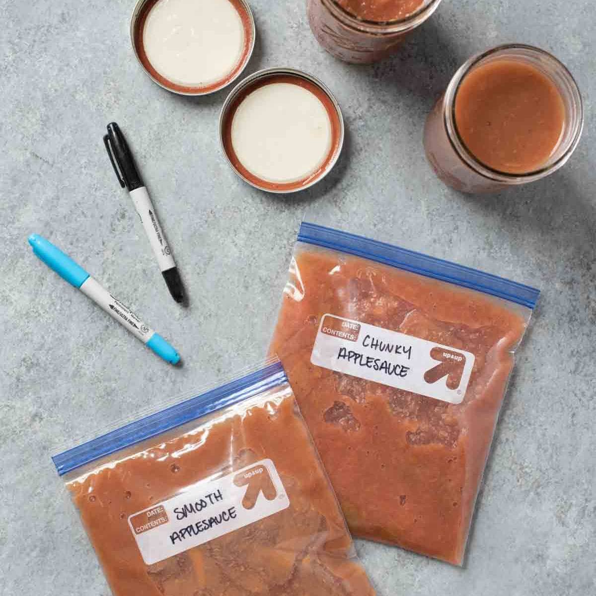 Labeled freezer bags of applesauce