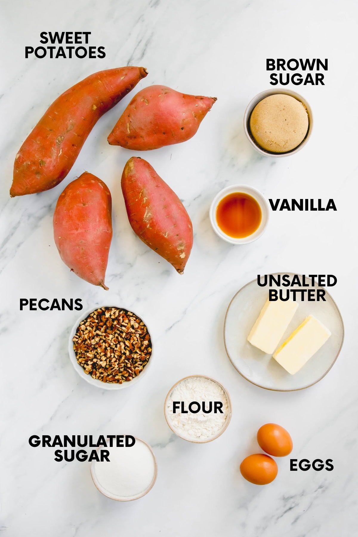 Ingredients for sweet potato casserole with pecans: sweet potatoes, brown sugar, vanilla, pecans, butter, flour, sugar, eggs.