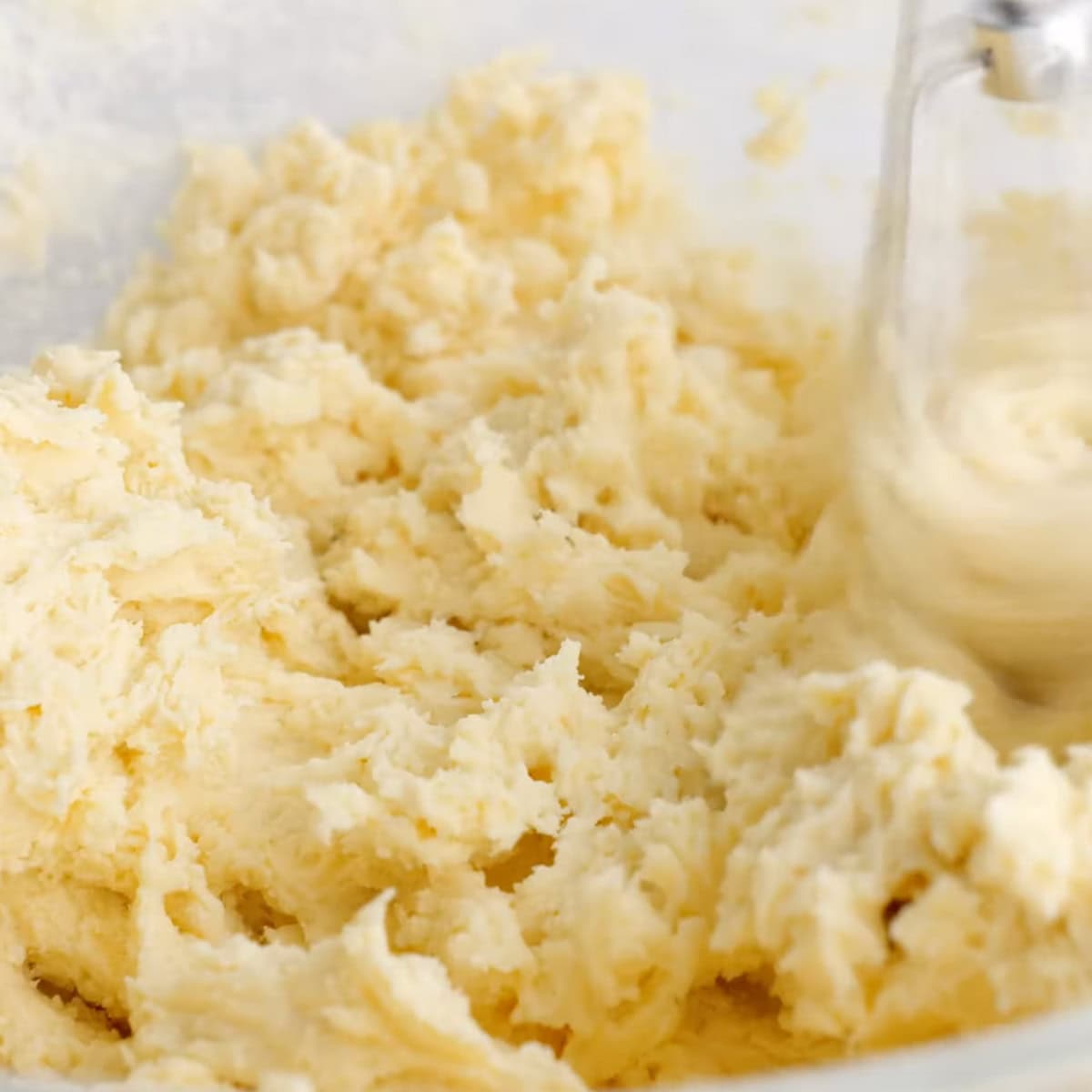 Cookie dough for thumbprint cookies with jam.