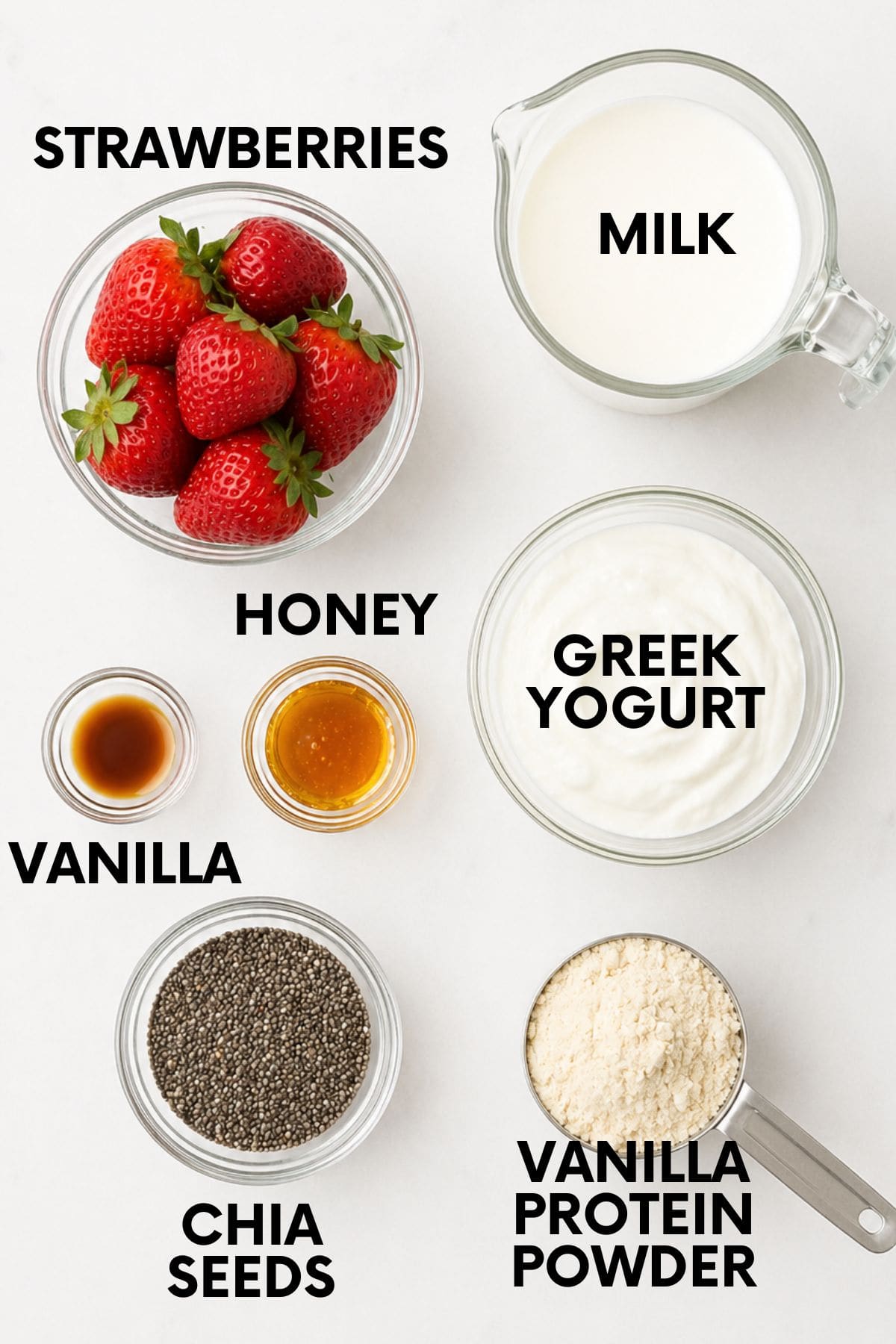 Strawberry chia pudding ingredients in glass bowls on a white surface - fresh strawberries, milk, Greek yogurt, vanilla extract, honey, chia seeds, and vanilla protein powder